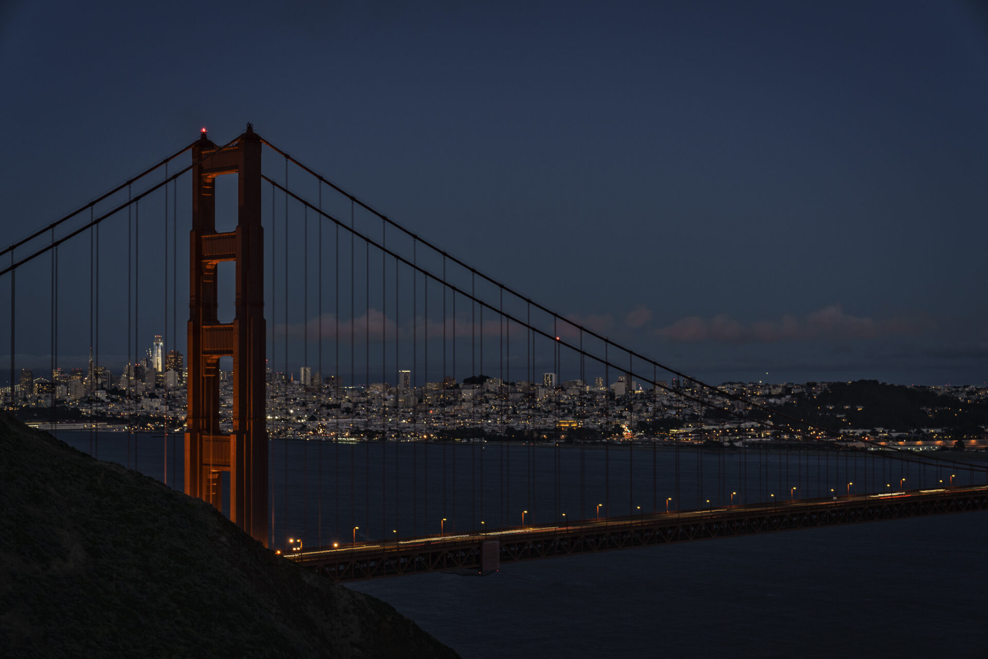 Golden Gate Bridge at Night with San Francisco in Background