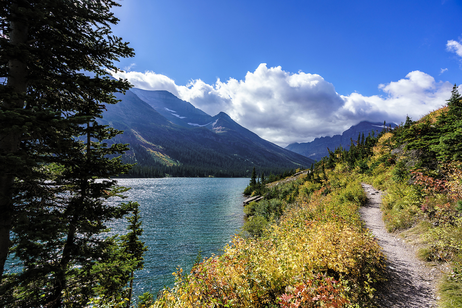 Hiking around Lake Josephine on the Grinnell Glacier Trail in Glacier National Park