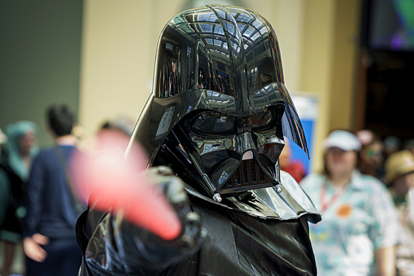 Darth Vader threatens with his lightsaber at Otakon 2023