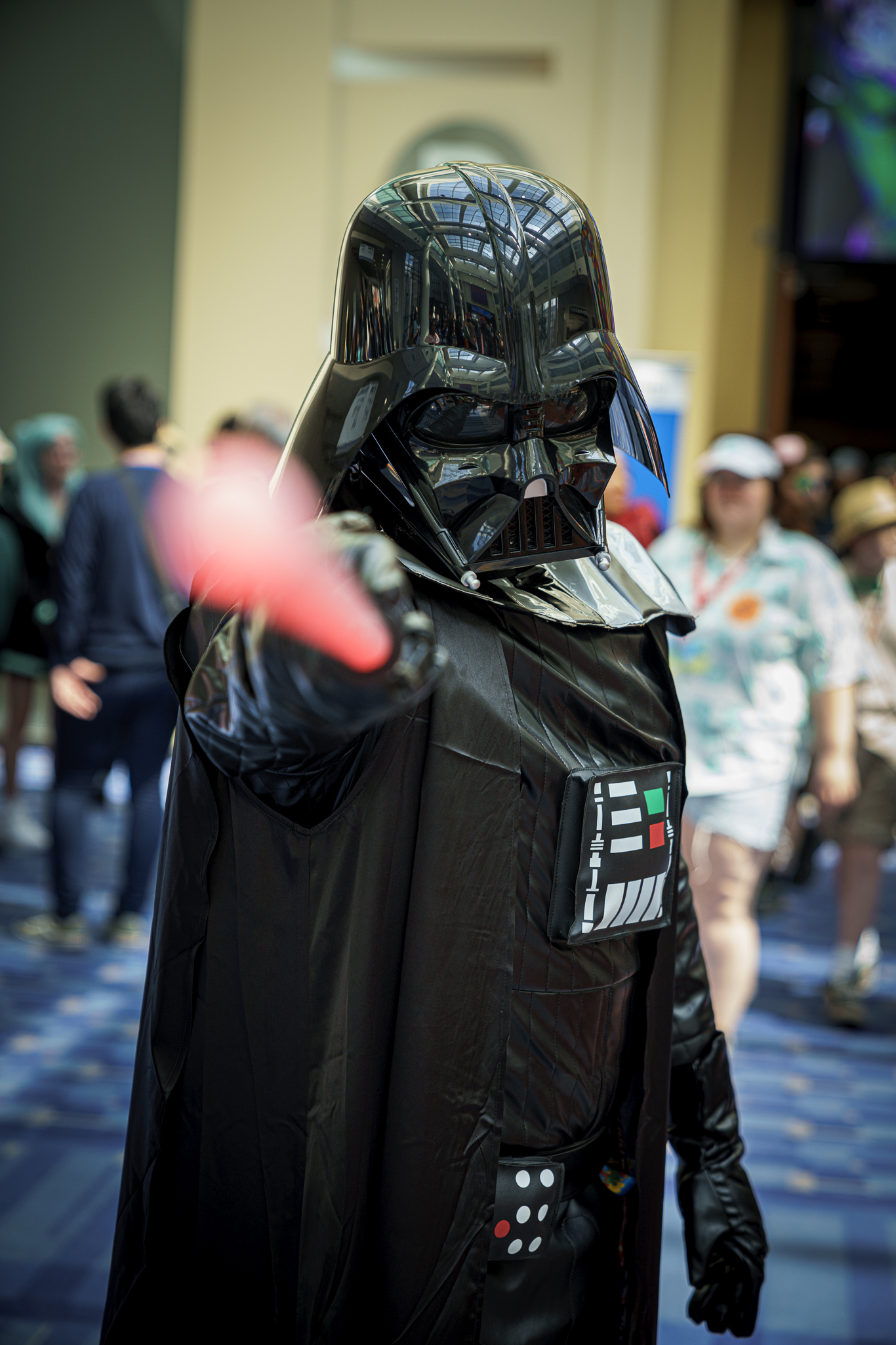 Darth Vader threatens with his lightsaber at Otakon 2023